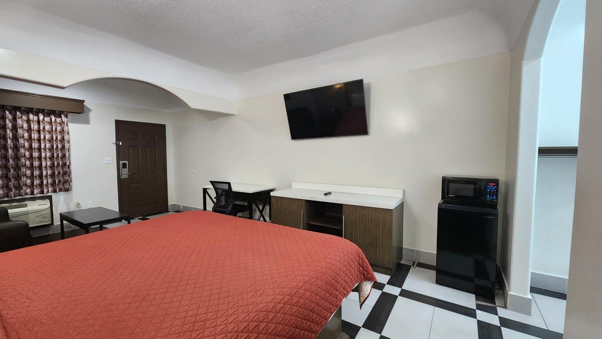 Scottish Inn & Suites Sam Houston Parkway ภายนอก รูปภาพ