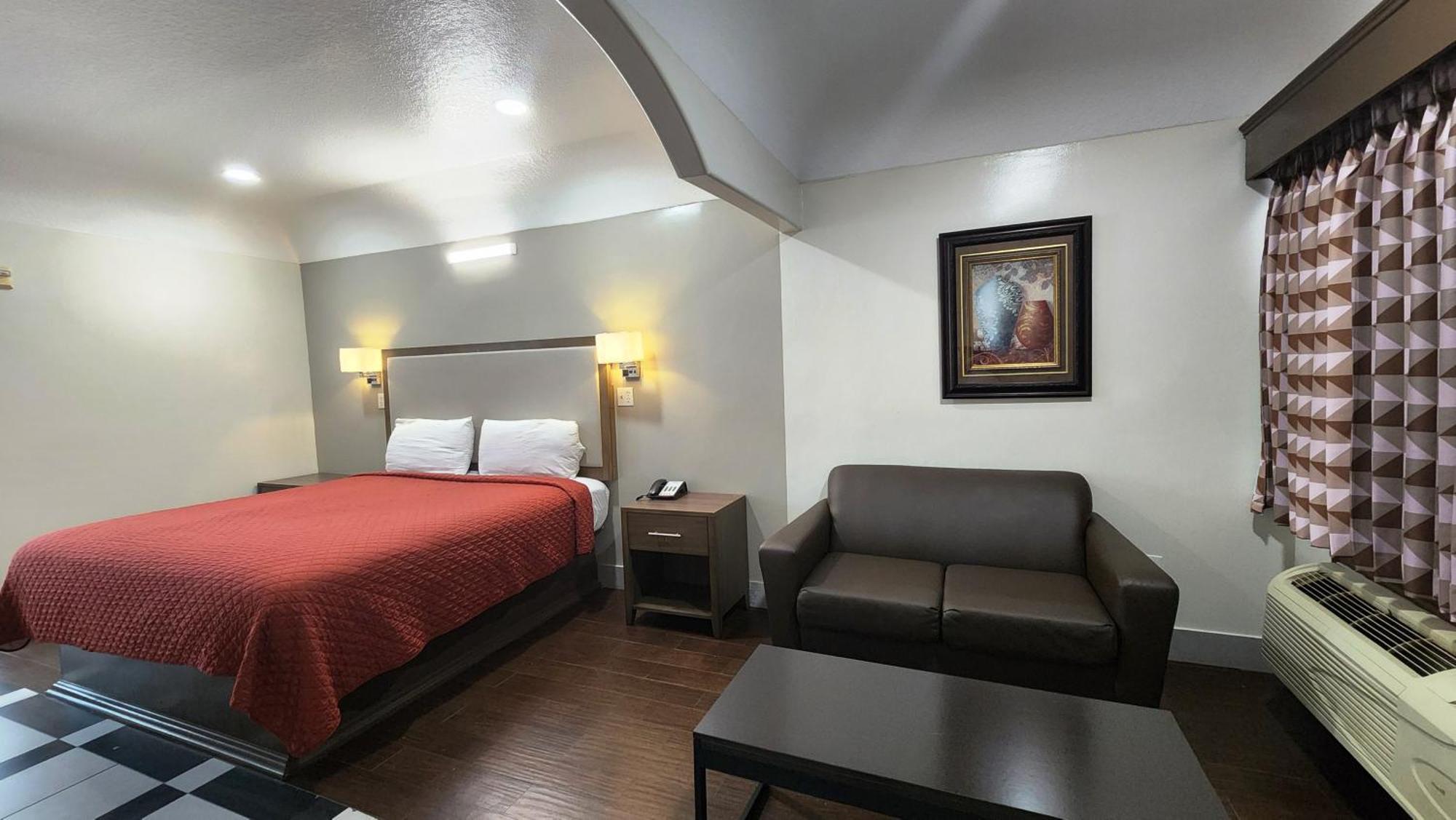 Scottish Inn & Suites Sam Houston Parkway ภายนอก รูปภาพ