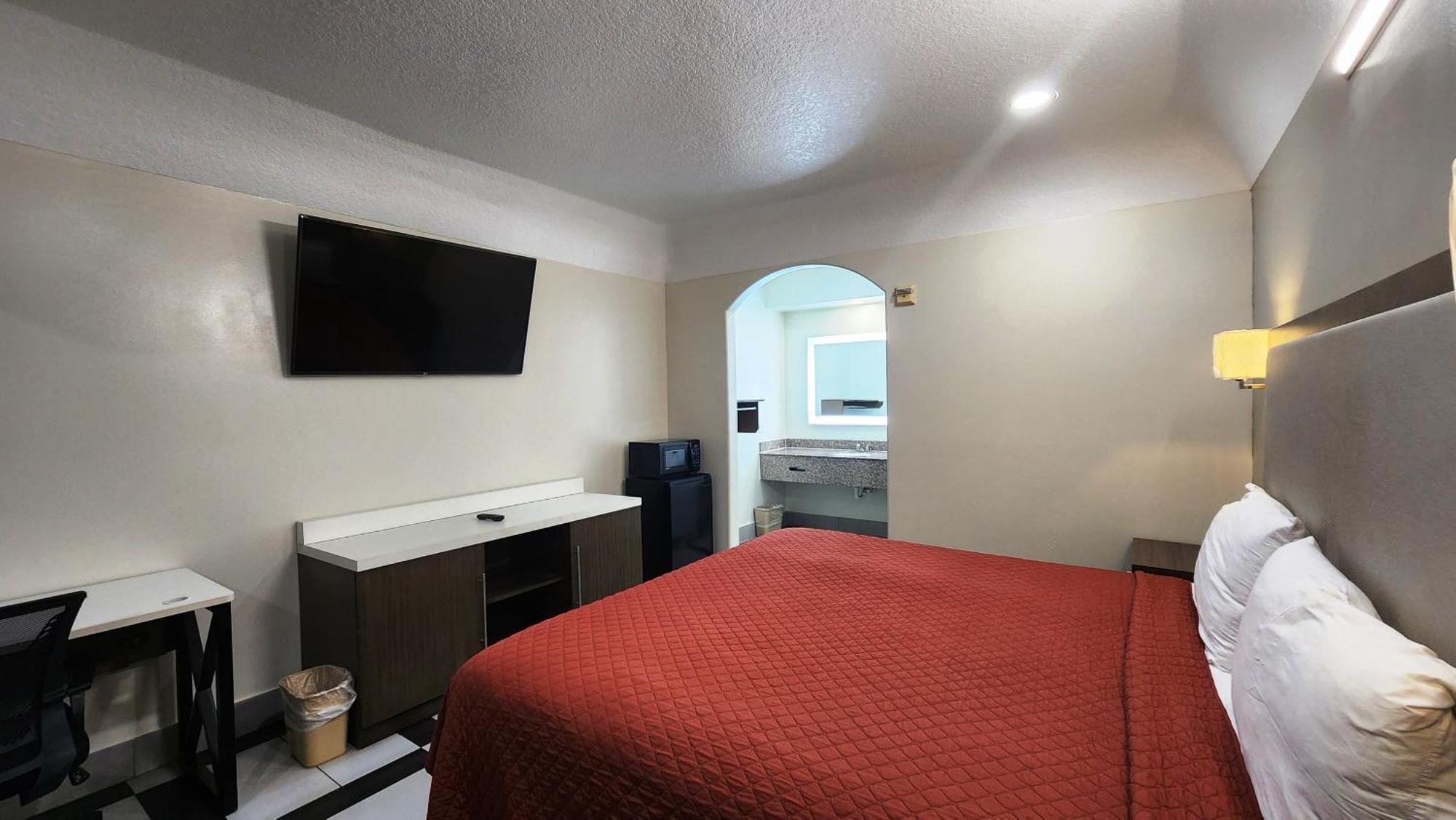 Scottish Inn & Suites Sam Houston Parkway ภายนอก รูปภาพ