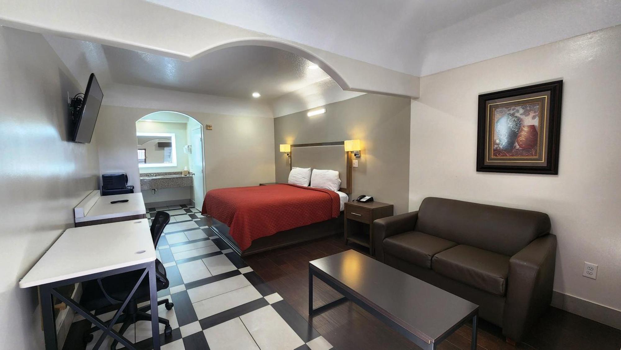 Scottish Inn & Suites Sam Houston Parkway ภายนอก รูปภาพ
