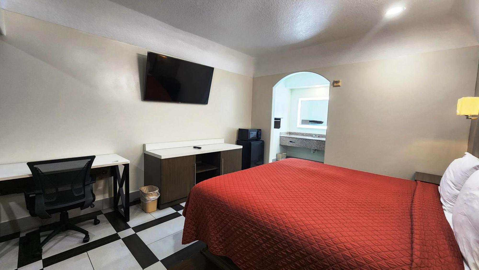 Scottish Inn & Suites Sam Houston Parkway ภายนอก รูปภาพ